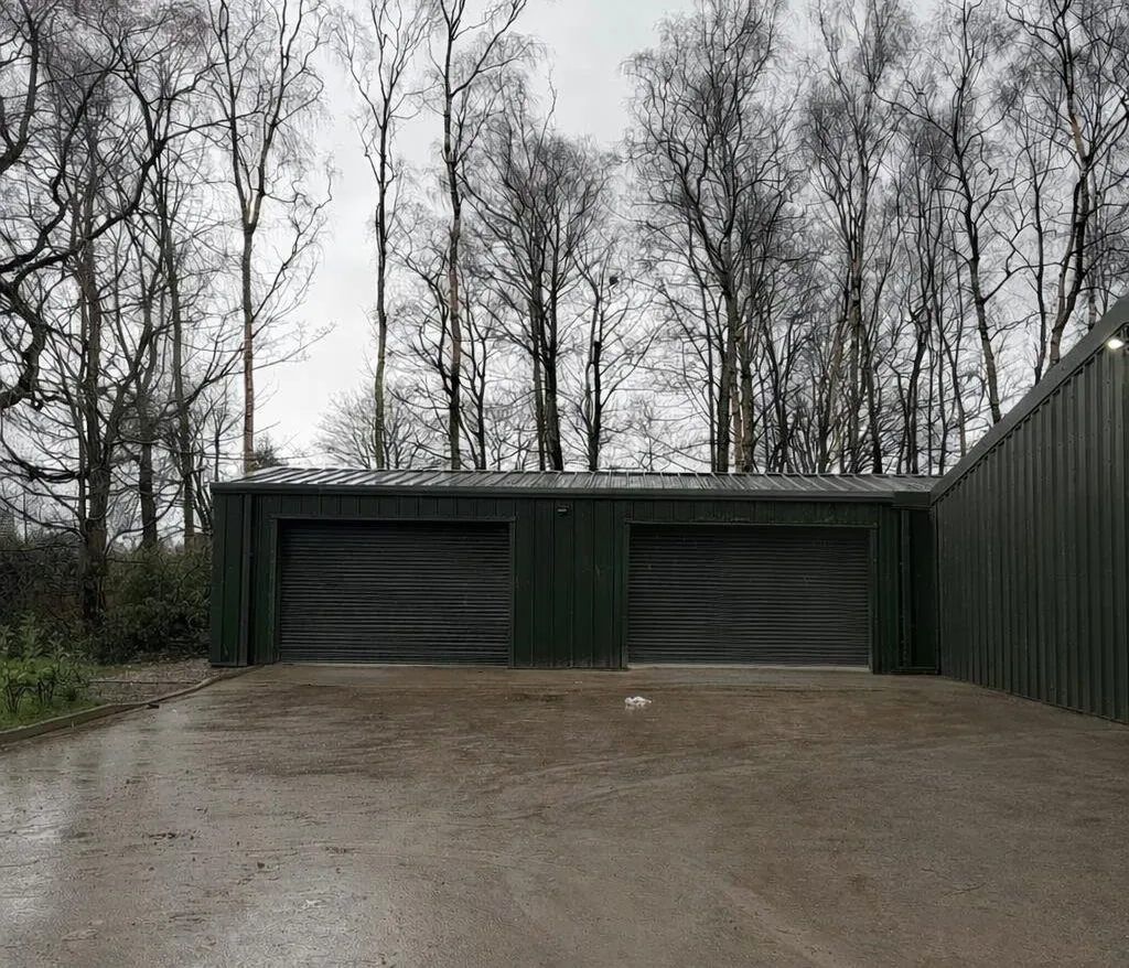 Dark green steel building (Phase 2) for Durham Animal Feeds