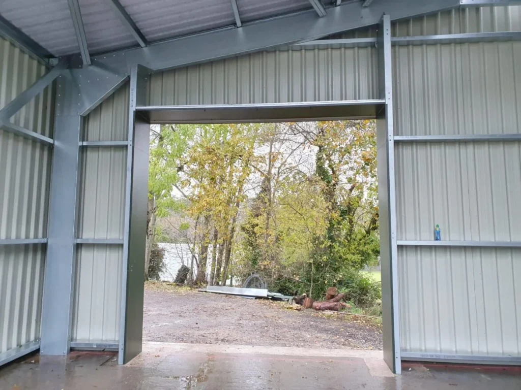 Interior doorway view of the steel building at Field Honey Farm