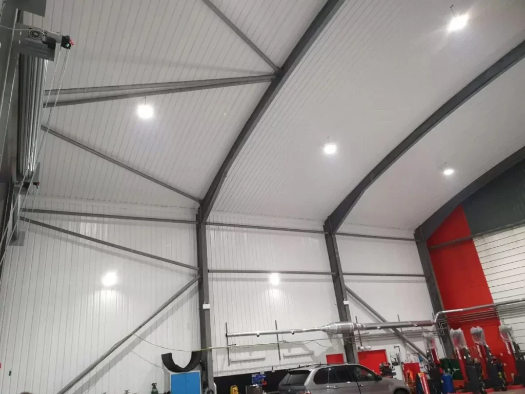 Interior canopy infill roof structure for H W Martin