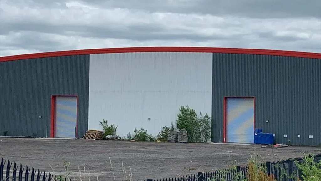 H W Martin building with new roller shutter doors
