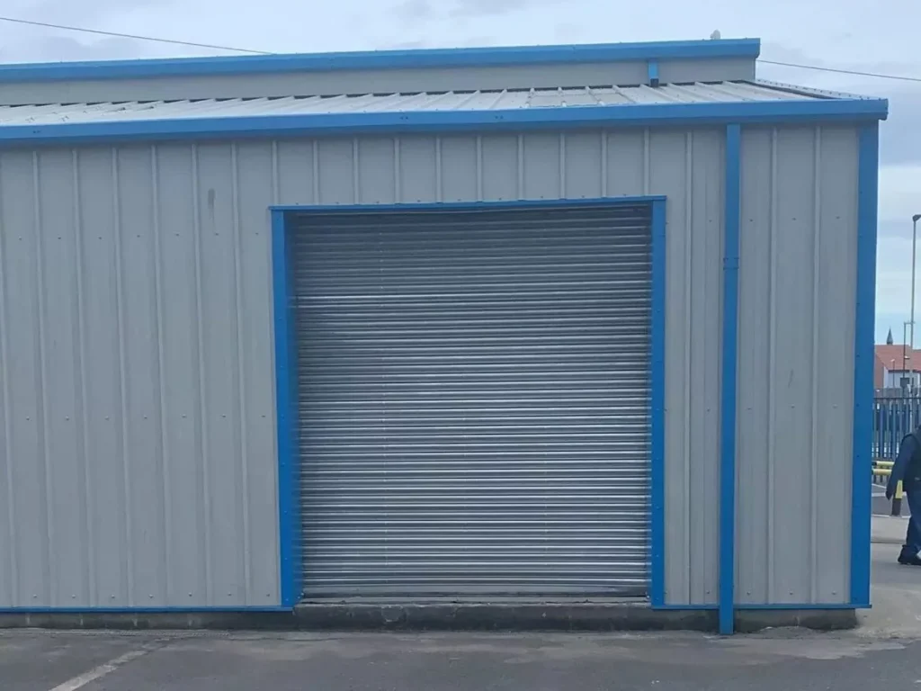 New roller shutter opening formed in the clad elevation at Simply Food Solutions Ltd