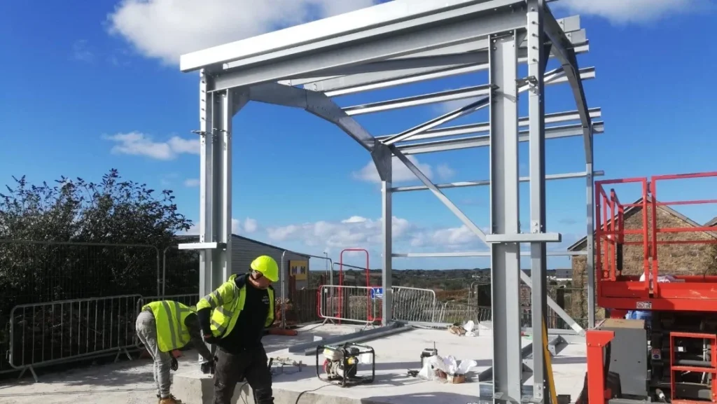 Hamilton Steel Buildings operatives erecting the galvanised steel frame at South Crofty Mine