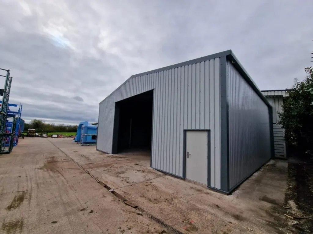 External view of a cold rolled steel building with grey cladding and open bay for Thorpe Design and Technologies Ltd
