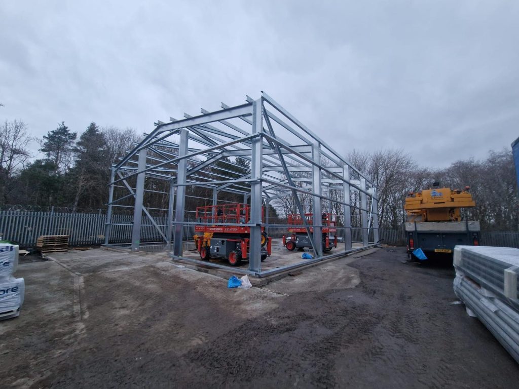 Galvanised steel portal frame under construction on a Hamilton Steel building project
