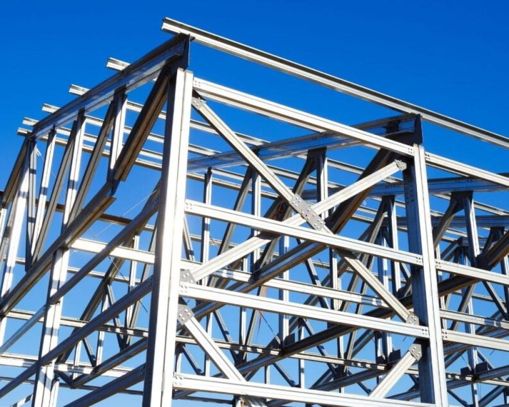 Steel building framework with blue sky
