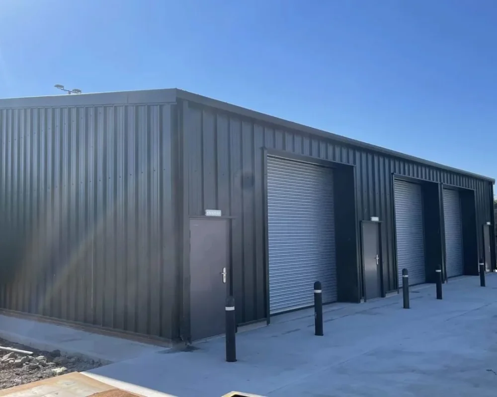 Anthracite steel building with roller shutter doors for Cleveland Transport