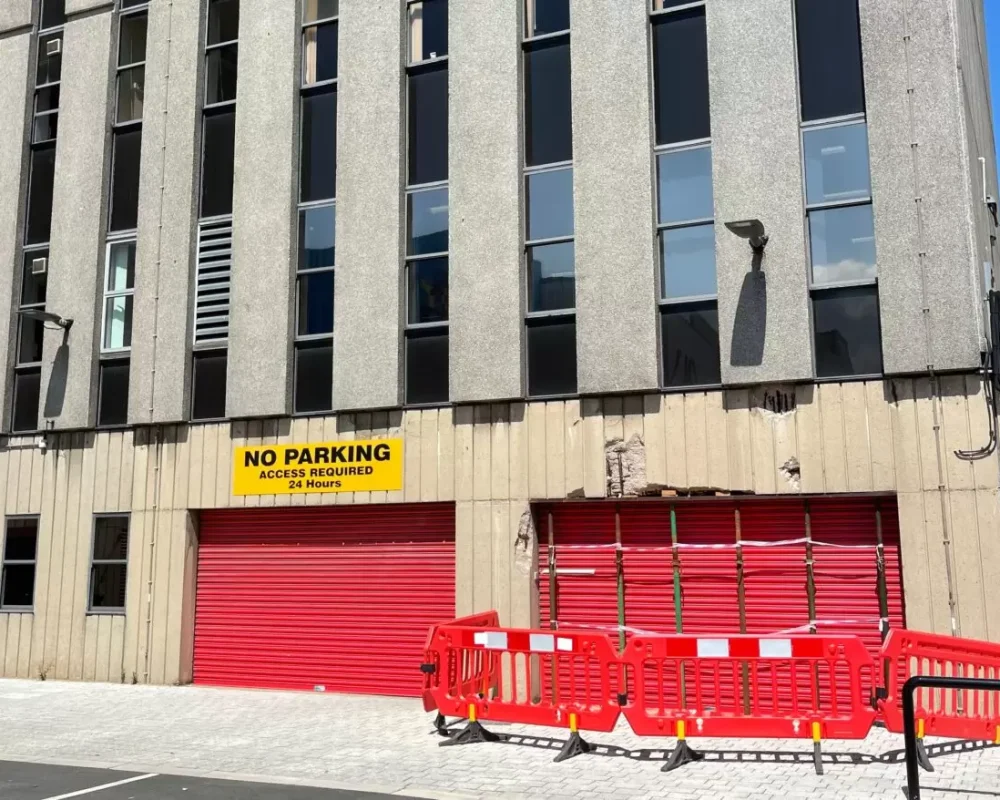 Red roller shutter doors fitted to Darlington Town Hall