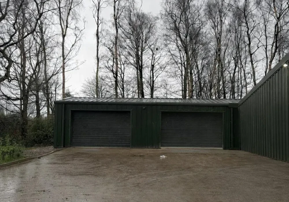 Dark green steel building (Phase 2) for Durham Animal Feeds
