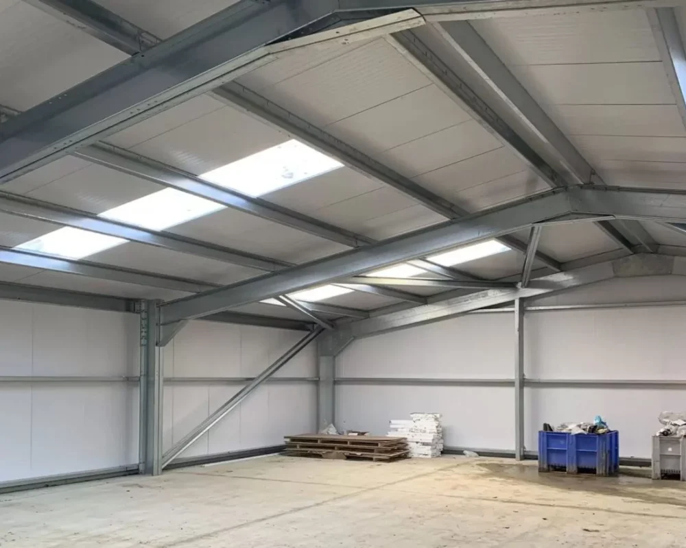 Interior roof structure with skylights at Durham Animal Feeds