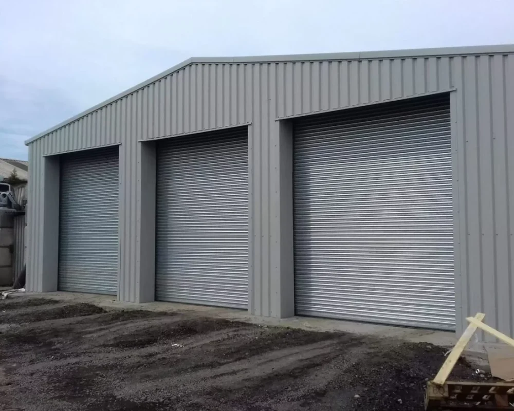 Steel building with three roller shutter doors for Ezi Mix Concrete