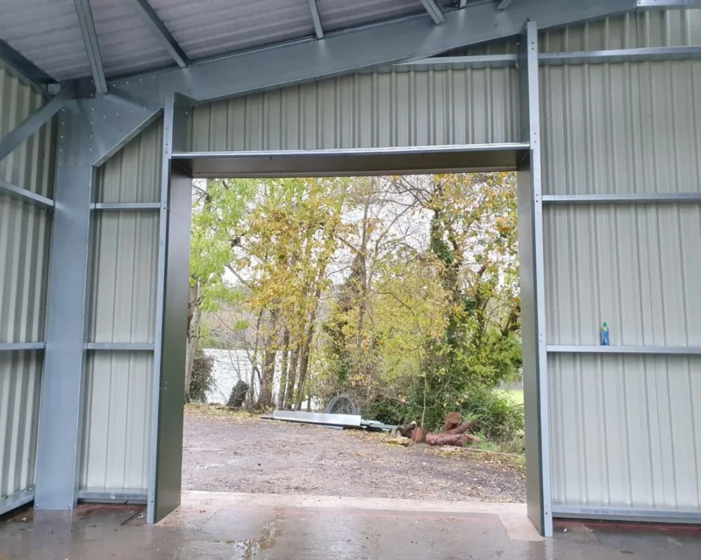 Interior doorway view of the steel building at Field Honey Farm