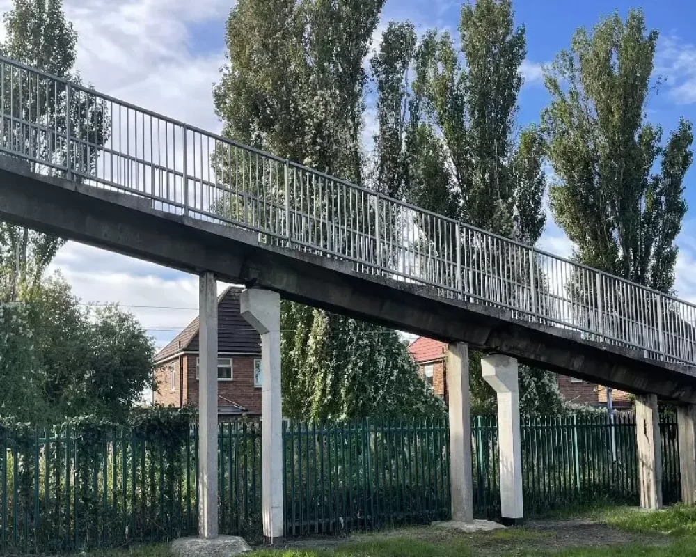 Concrete piers and railings of the Harrow Street footbridge