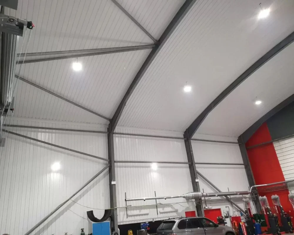 Interior canopy infill roof structure for H W Martin