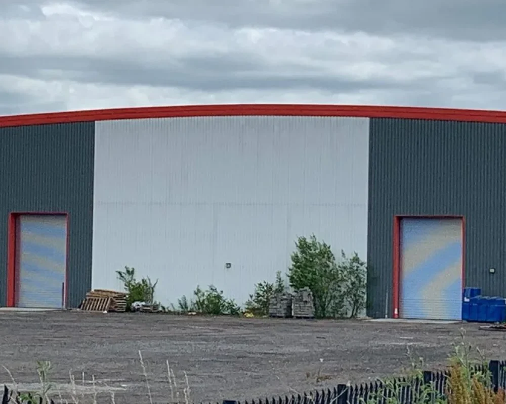 H W Martin building with new roller shutter doors