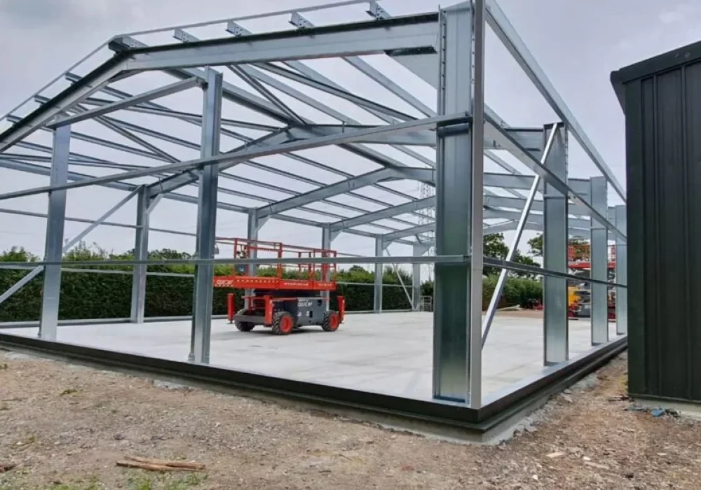 Galvanised steel portal frame erected on the concrete slab at Lewhurst Farm