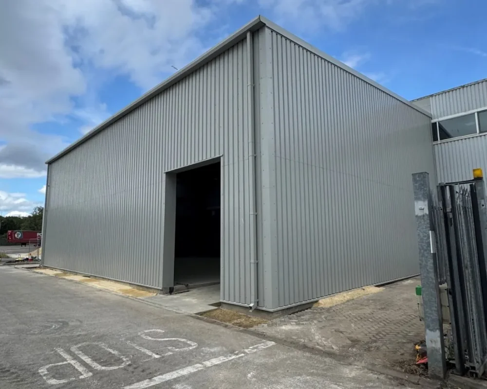 Grey-clad steel building exterior for Shalam Thermoforming