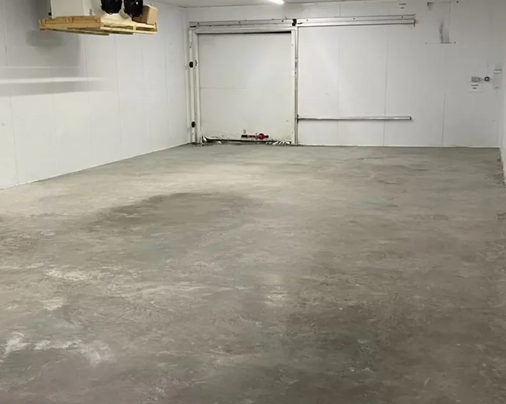 New power floated coldstore floor inside the insulated cold room at Simply Food Solutions Ltd