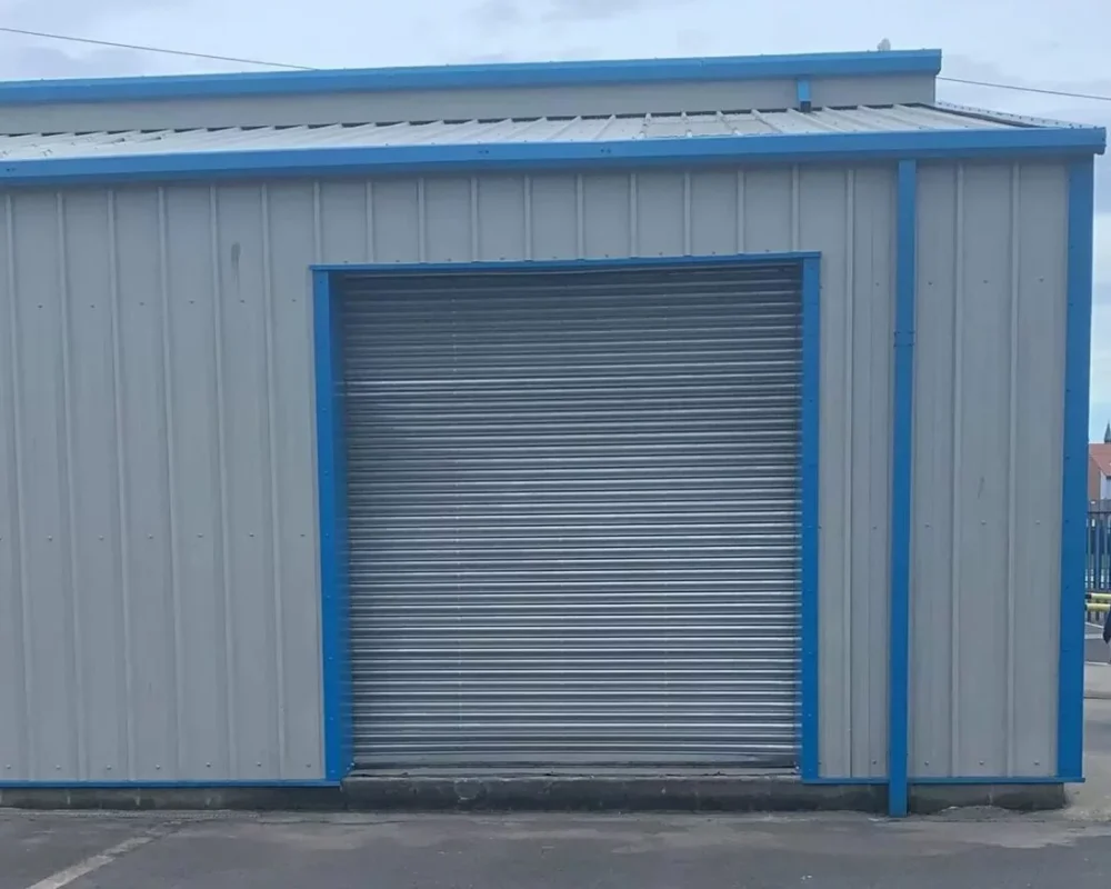 New roller shutter opening formed in the clad elevation at Simply Food Solutions Ltd