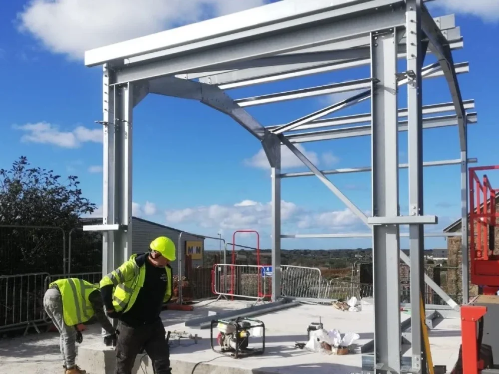 Hamilton Steel Buildings operatives erecting the galvanised steel frame at South Crofty Mine