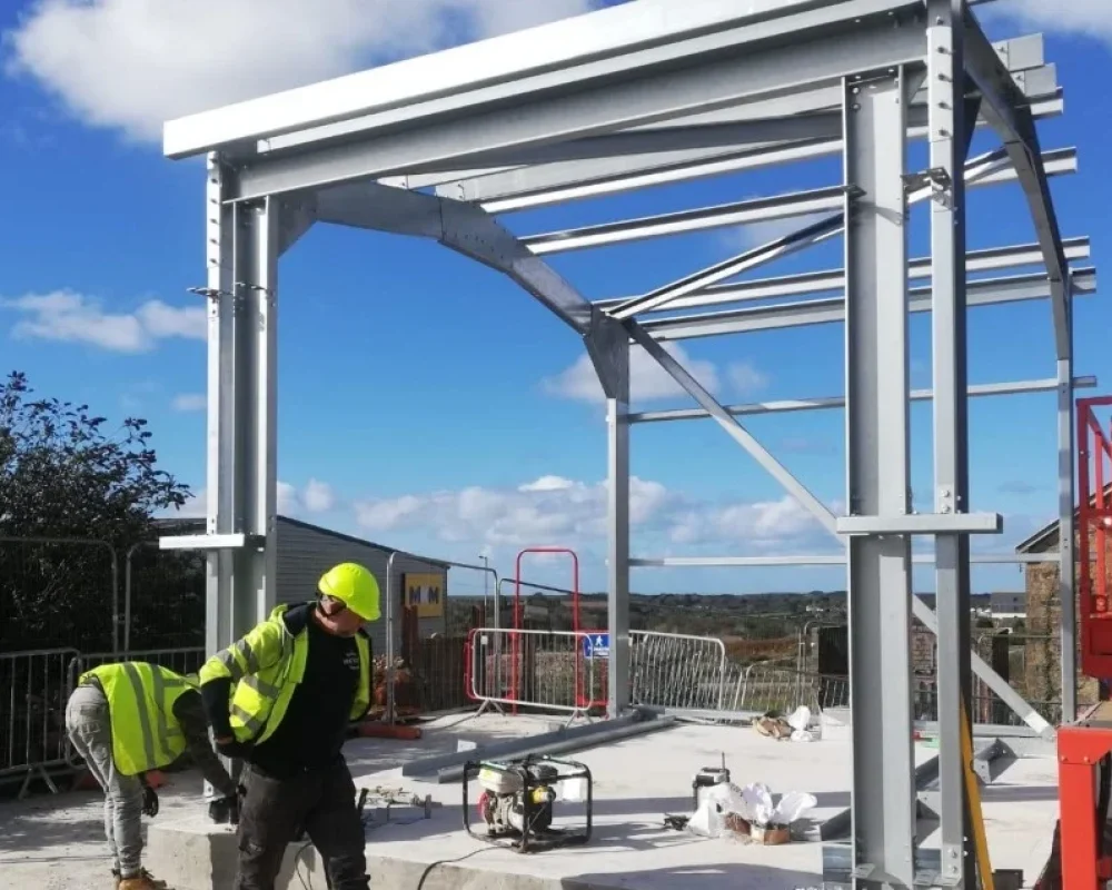 Hamilton Steel Buildings operatives erecting the galvanised steel frame at South Crofty Mine