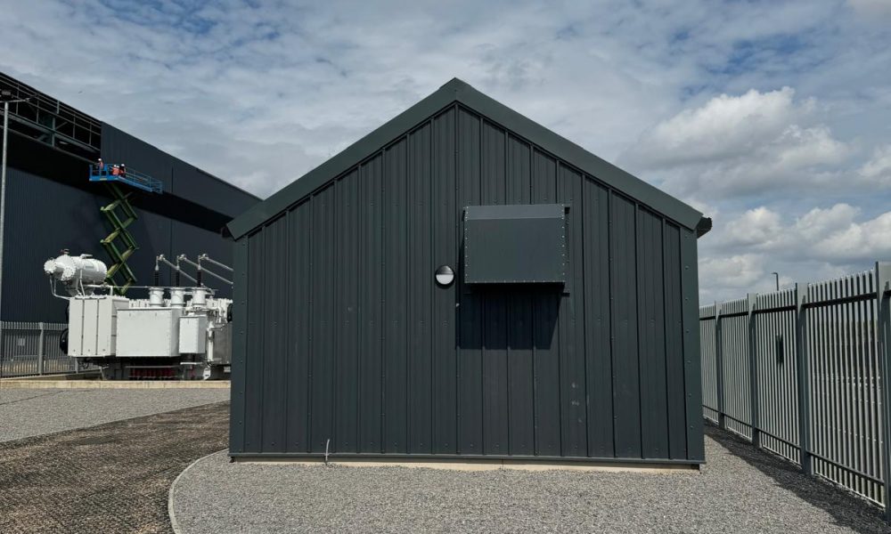 Ventilation panel and vent fitted to the side of a small steel switch room building