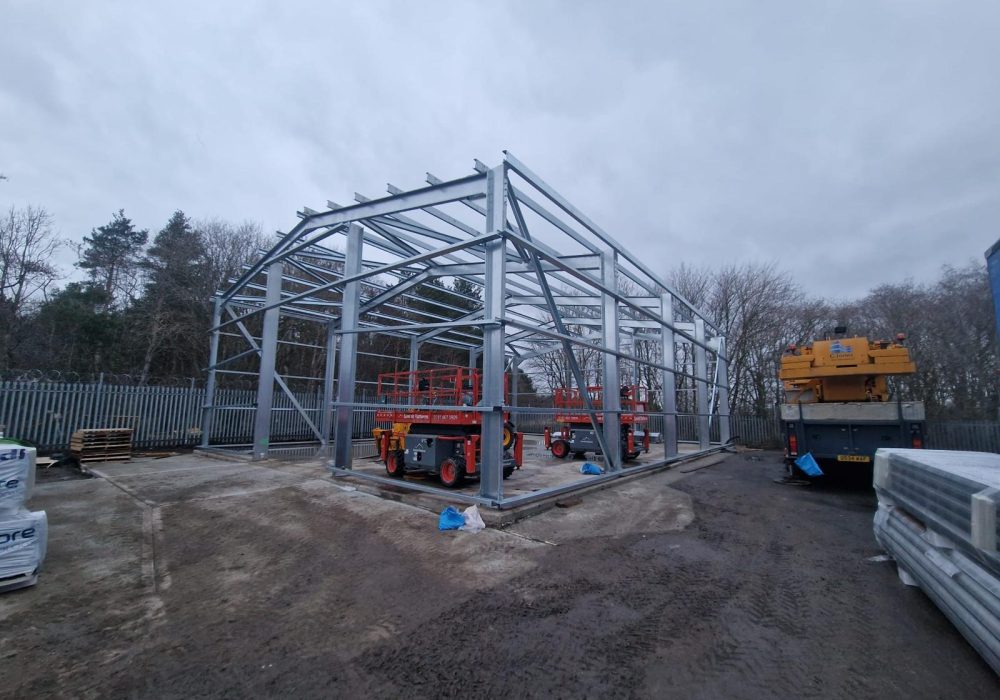 Galvanised steel portal frame under construction on a Hamilton Steel building project