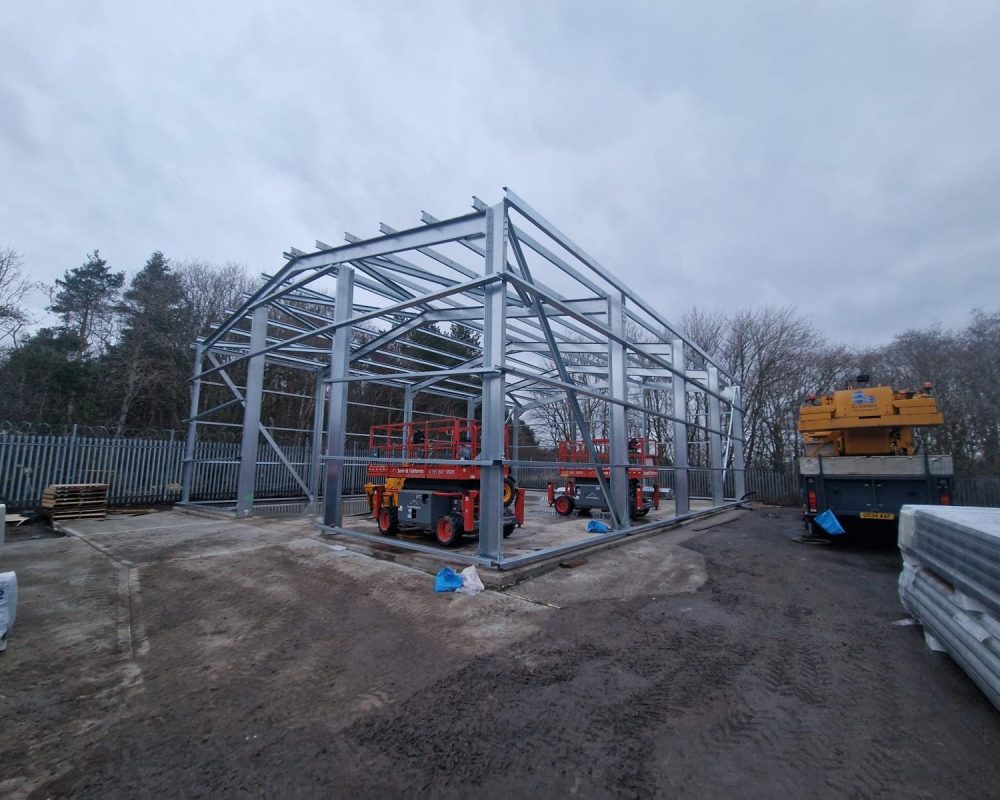 Galvanised steel portal frame under construction on a Hamilton Steel building project